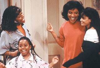 Illustration for article titled Iconic Black Moms Through the Years